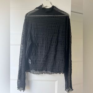 Sheer mock neck top